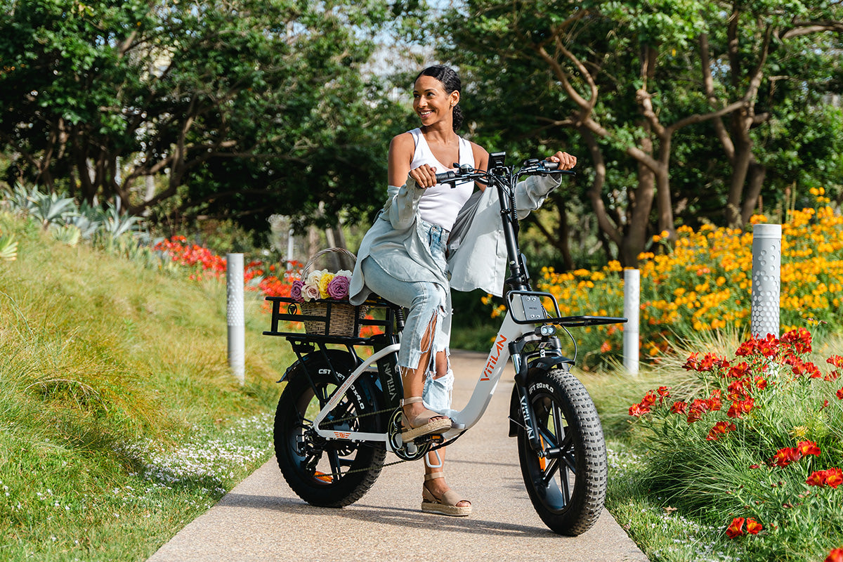 VITILAN U7 white electric bike with rider showing upright riding position