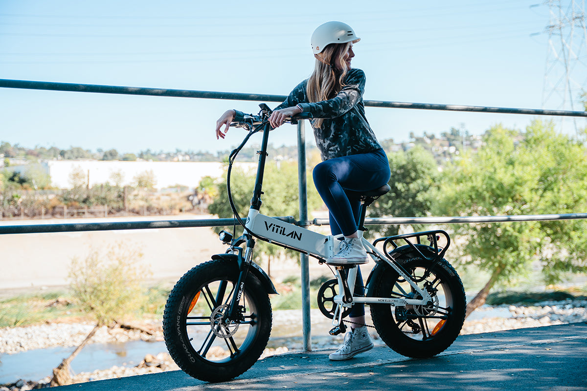 VITILAN V3 2.0 white electric bike with rider outdoors