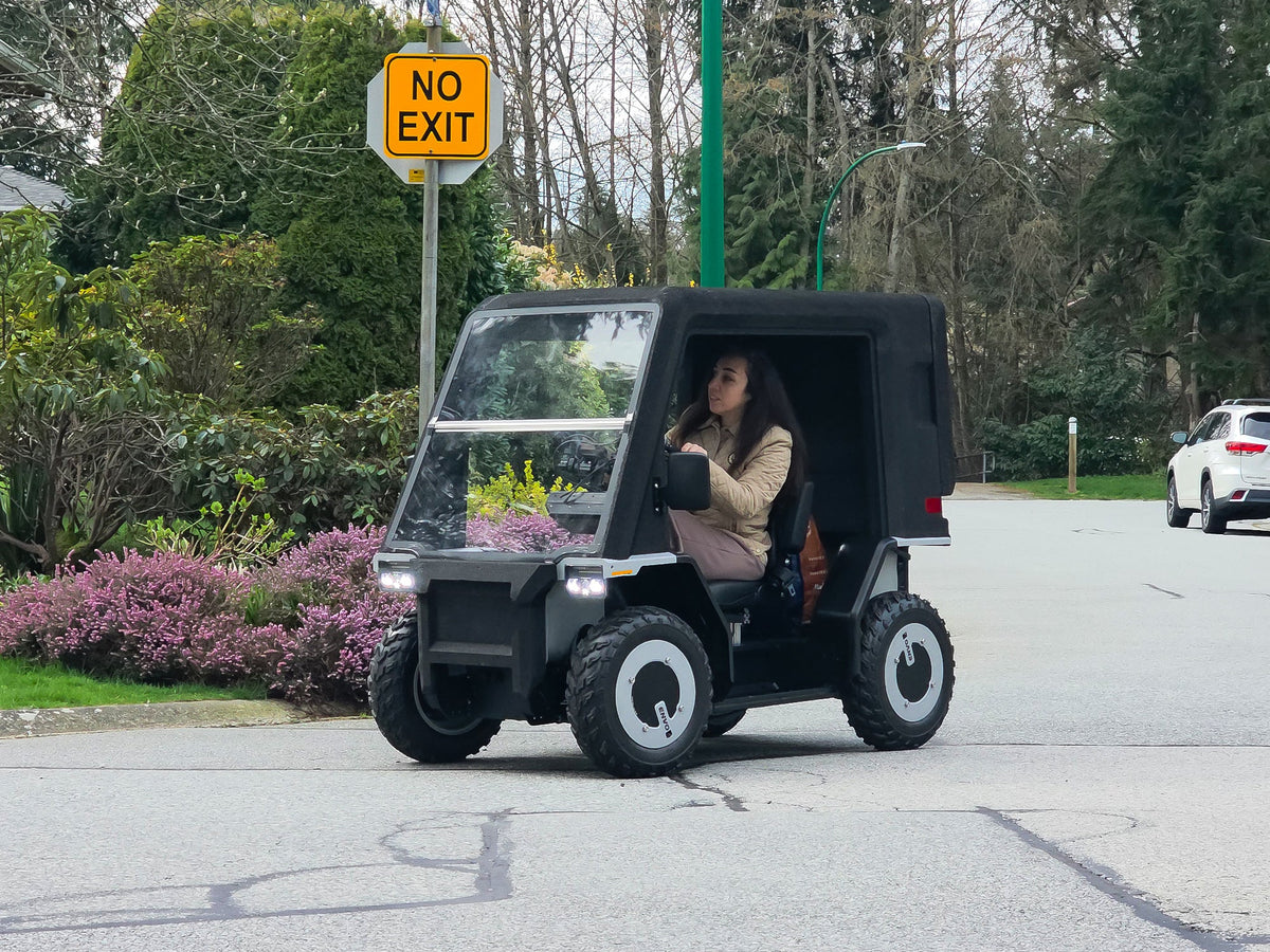 ENVO LV20 electric microcar in a lifestyle setting