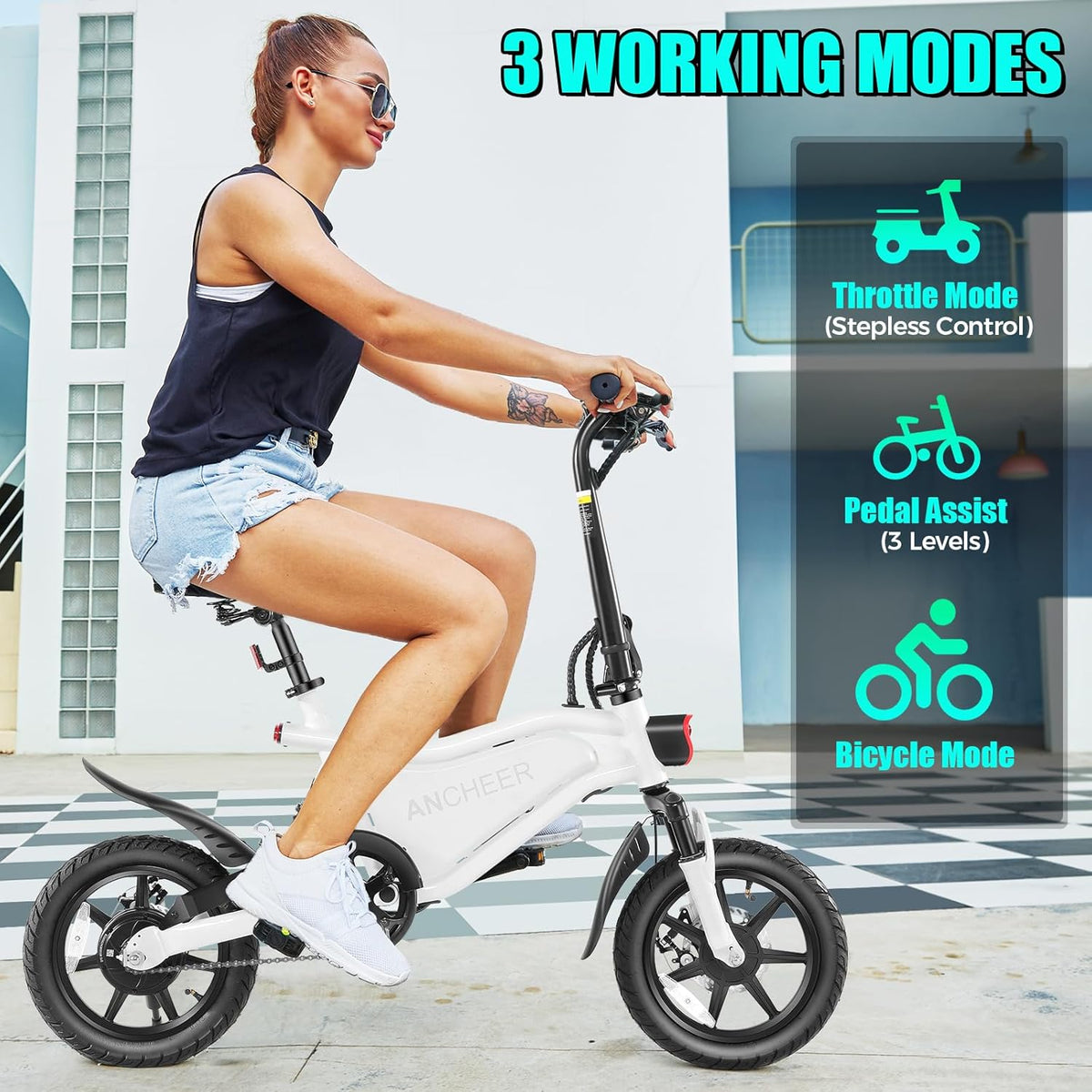 ANCHEER suspension fork close-up — spring travel absorbs road cracks and speed bumps that rigid folding bikes pass straight through