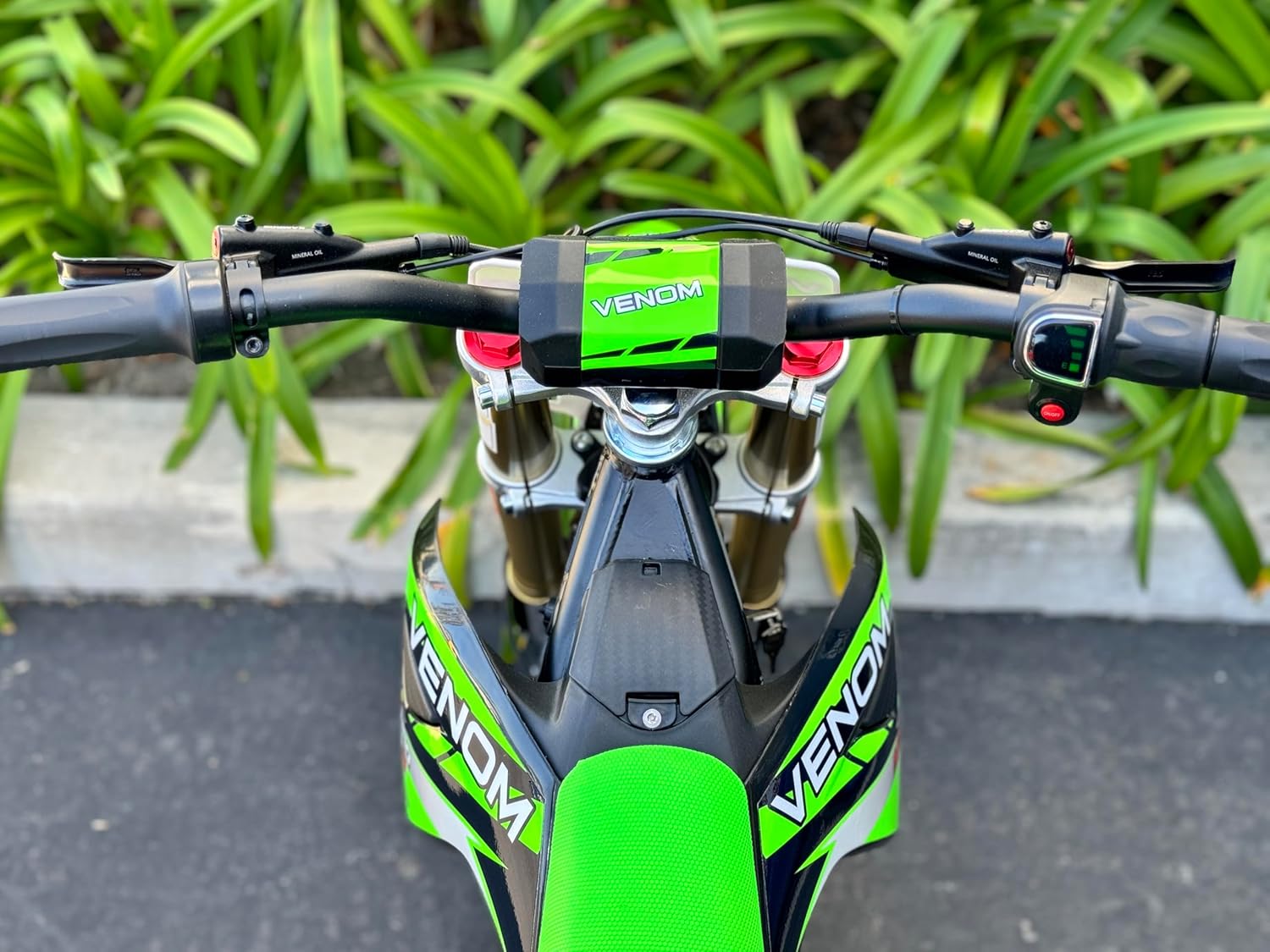 Close-up of the knobby tires on the Venom Pro dirt bike