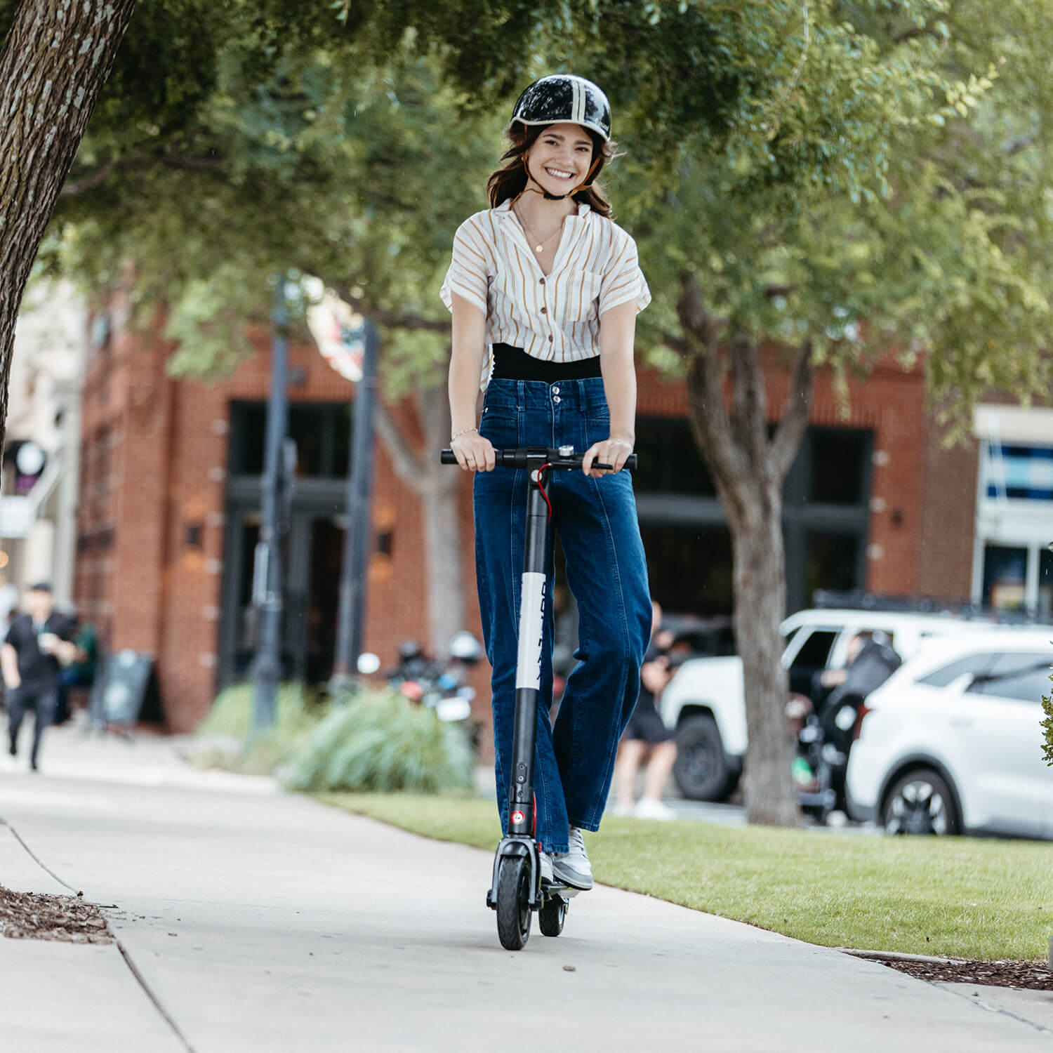 GOTRAX GXL V2 electric scooter lifestyle riding photo vertical