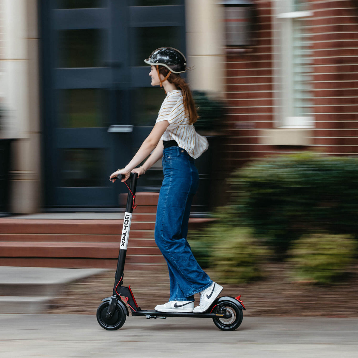 GOTRAX GXL V2 electric scooter riding view