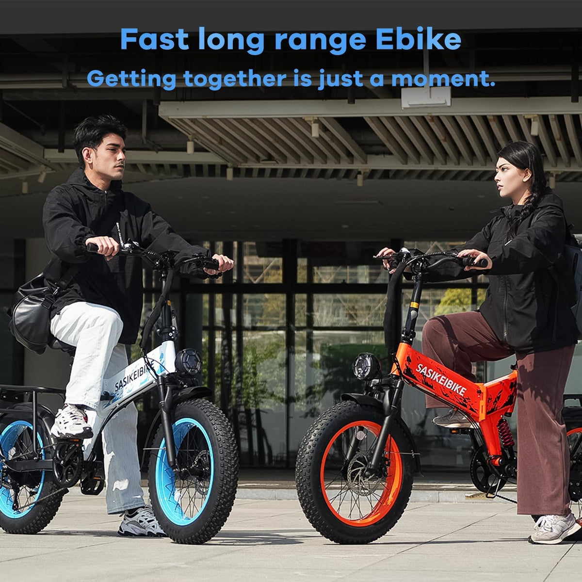 SASIKEI E7 with rider for scale — fat tires give a wider, planted stance than slim-tire folders