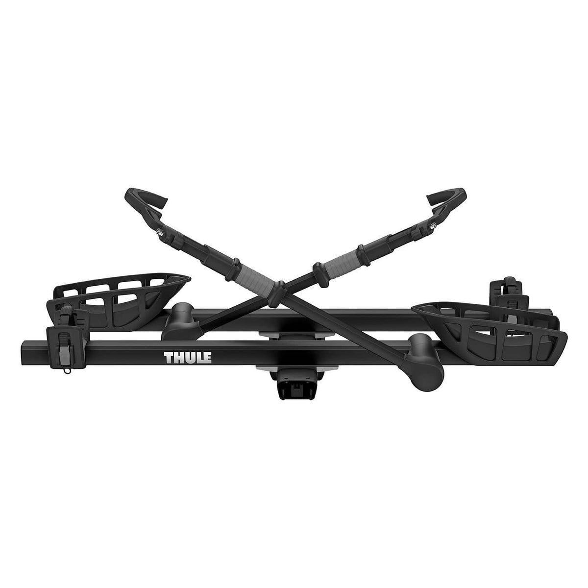 Thule T2 Pro XT add-on with a bike loaded — shows the carrier deployed on the base rack, giving a family or group the capacity to haul three bikes in one trip