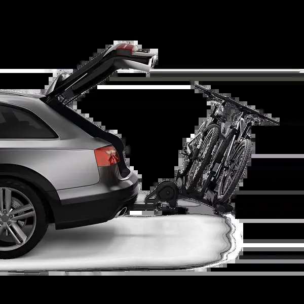 Thule T2 Pro XTR with two e-bikes loaded — shows the rack carrying heavy bikes up to 60 lb each, confirming it handles electric models